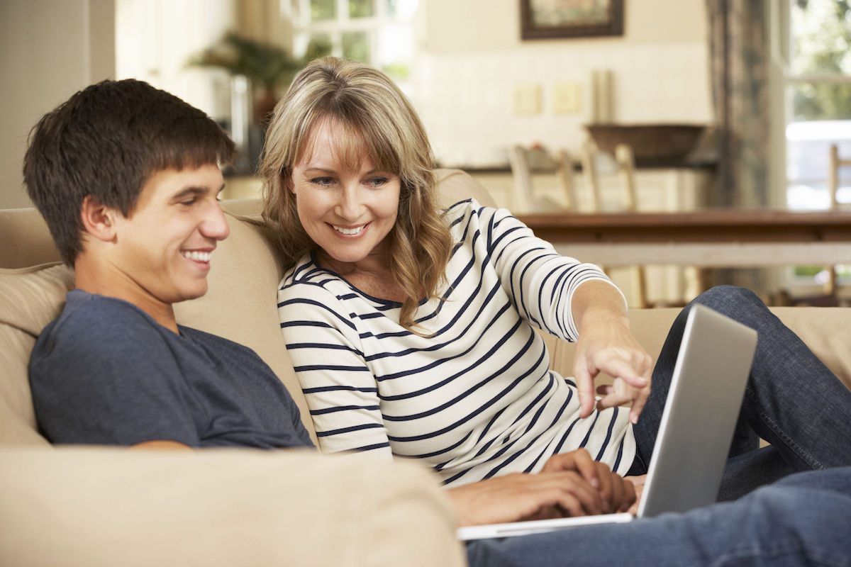 Mom and son with laptop